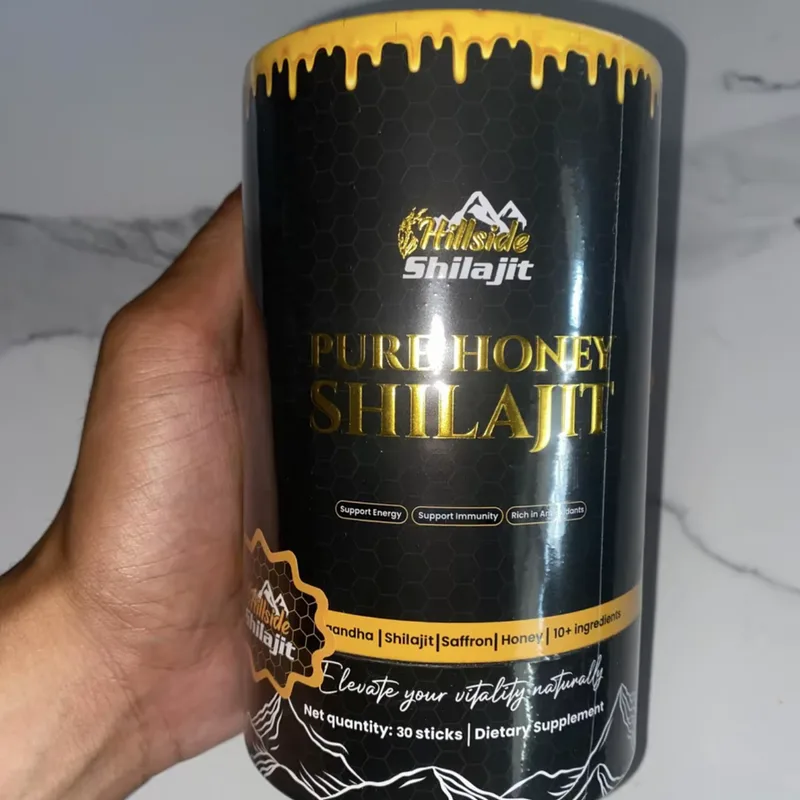 Buyer's photo — the Pure Honey Shilajit tub held in the hand