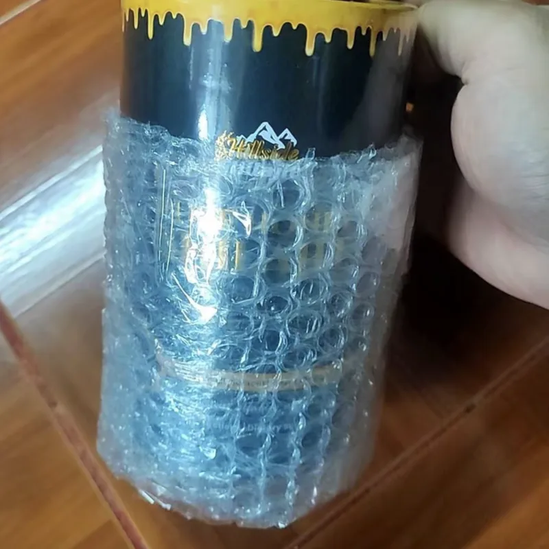 Buyer's photo — the tub still wrapped in bubble wrap as it arrived