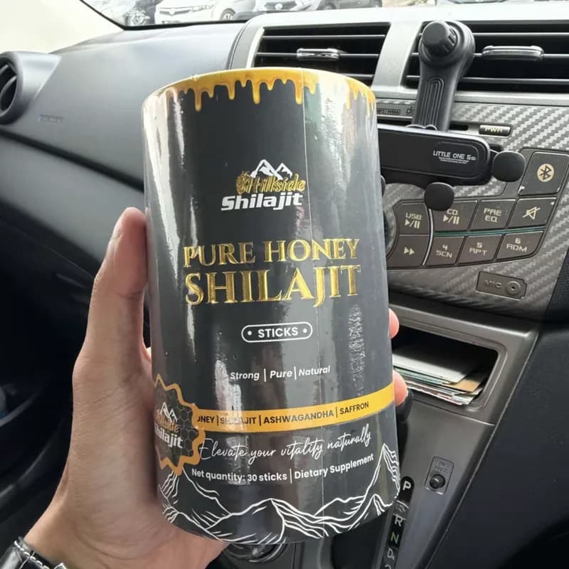 Buyer's photo — the tub held beside a car dashboard