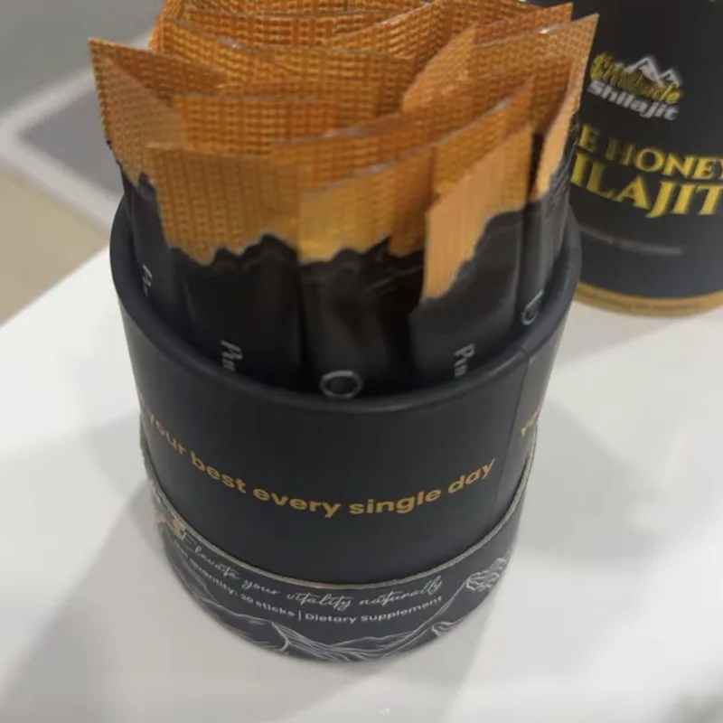 Buyer's photo — the opened tub full of sticks, its lid beside it