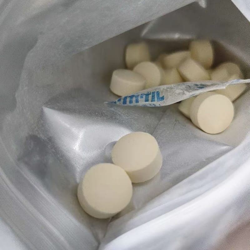 Buyer’s photo looking into an opened pouch, with the chewable tablets inside