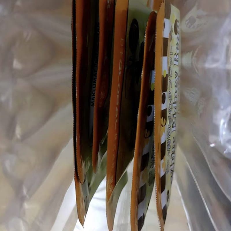 Buyer’s photo of several pouches wrapped together in the delivery packaging
