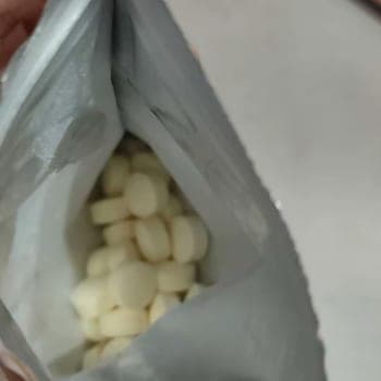 Buyer’s photo of an opened pouch with the chewable tablets inside